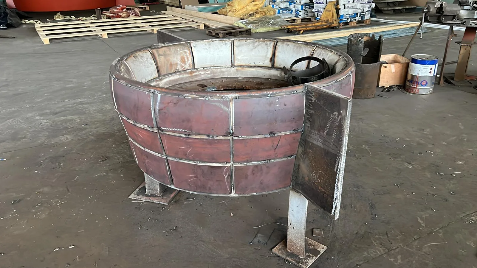 Large circular steel component during fabrication